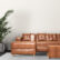 luxurious-modern-interior-living-room-gray-sofa-white-flooring-white-wall-3d-rendering